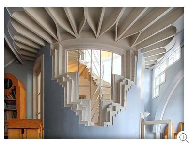 18/26 Cosmic House - the architectural library, showing the solar stair window