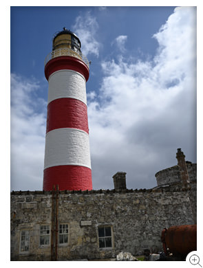 12/14 The red bands on Eilean Glas Lighthouse's 1824 tower were added in 1915 - 1916.